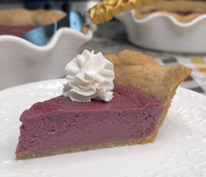 A slice of purple sweet potato pie.